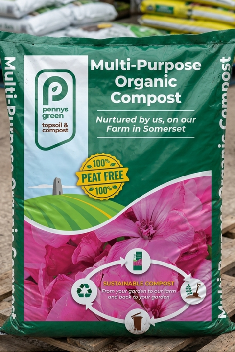 Packs of Pennys Green Multi-Purpose Organic Compost on a wooden pallet.